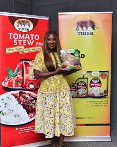 Mercy Johnson with Tiger Spices products